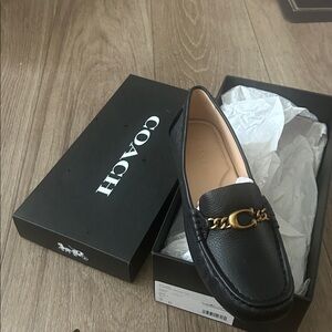 Coach Black Leather Loafers with Gold Chain Accent